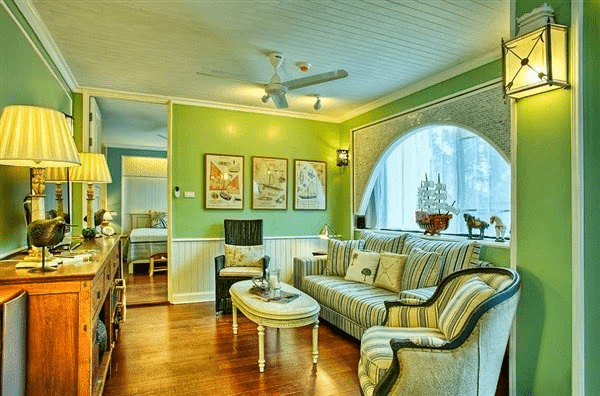 Gam màu xanh lá đem lại sự trẻ trung, hiện đại cho phòng khách